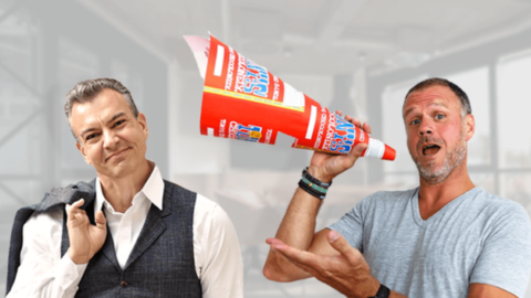 Two joyful men at work symbolizing the power of positivity in the workplace