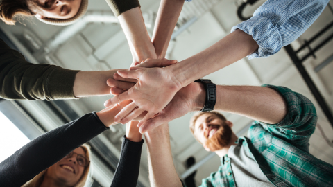 Colleagues praising each other for a job well done