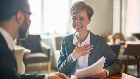 Two employees giving each other feedback