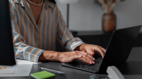 Woman at work using an employee engagement platform