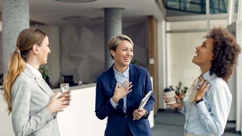 Happy employees talking