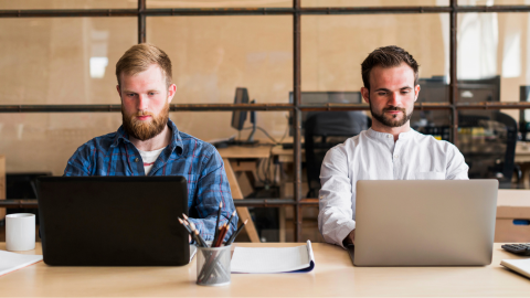 Employees filling out the employee engagement survey