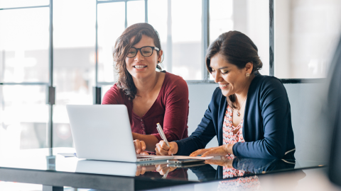 Two employees having one-on-one meeting