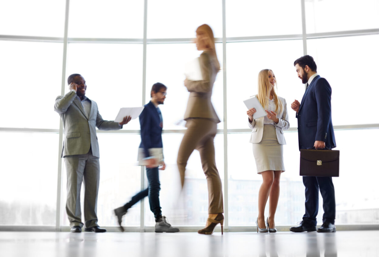 Employee engagement statistics 2025 — diverse team of professionals in a modern office environment