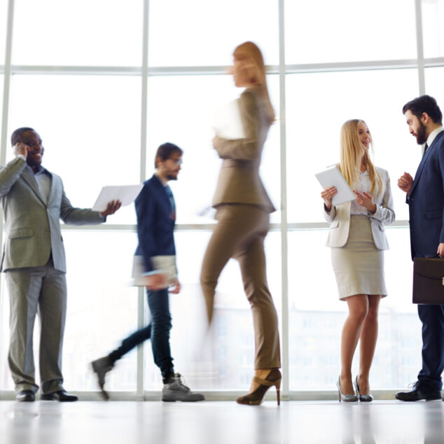 Employee engagement statistics 2025 — diverse team of professionals in a modern office environment